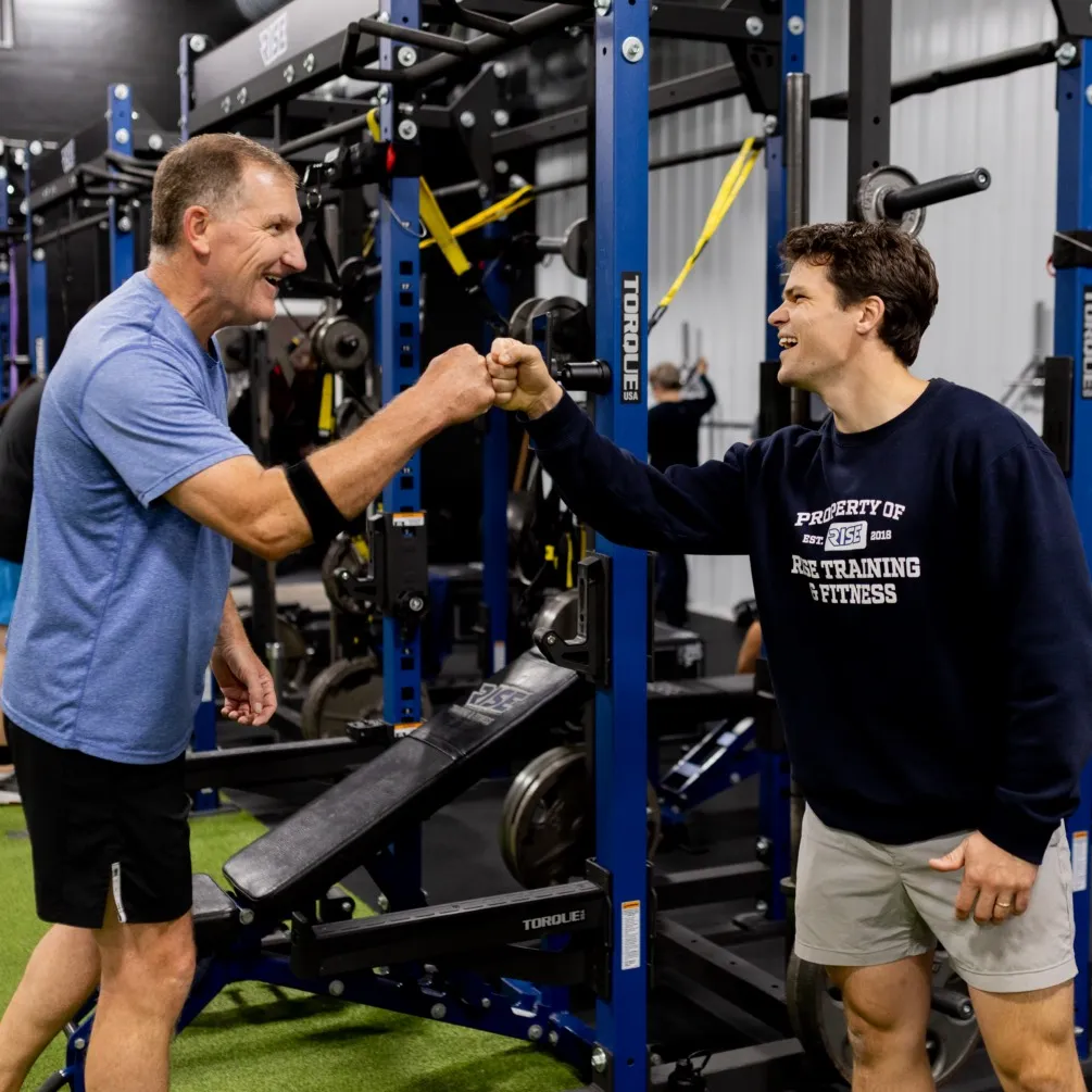 Dawson and member fist bumping